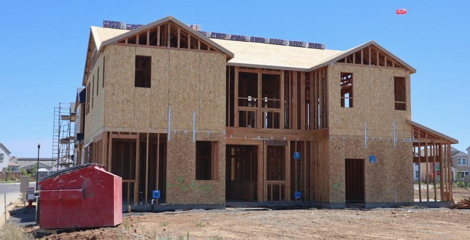 Stock photo of residential framing and roof system design work